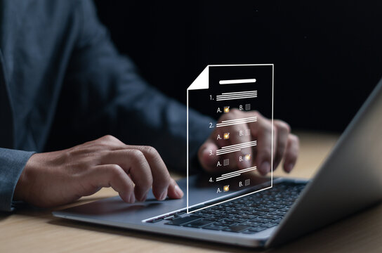 Businessman Choose correct answer for questionnaire, assessment, online exam, online learning, survey filling or computer-based test using Internet technology