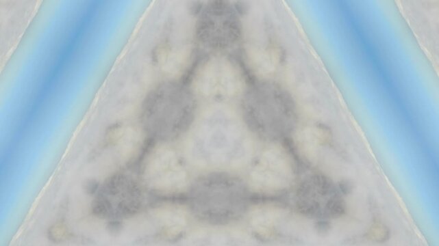 Cool blurry footage. The effect of a triangle in the movement of a kaleidoscope from the center of the frame. Cg