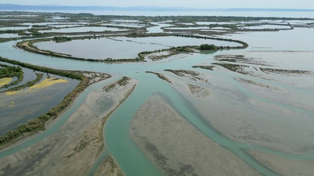 Grado Lagoon seen from above. Between waters, islands and uncontaminated nature