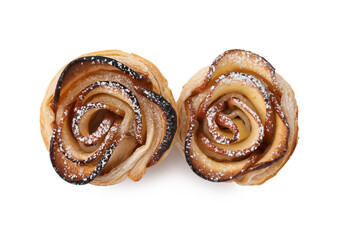 Freshly baked apple roses isolated on white, top view. Puff pastry