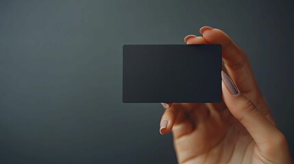 Hand Holding a Blank Black Card