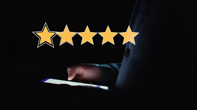 Animated five yellow stars increase and decrease in turn against the background of a Businessman working on a smartphone in the dark. The concept of maximum rating. Cg