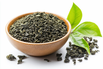 A wooden bowl filled with loose leaf green tea, accompanied by fresh green tea leaves, placed on a white background.