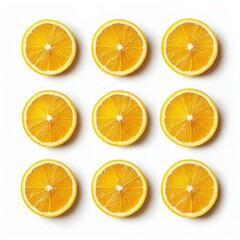 Fototapeta premium Fresh orange slices arranged in a grid on a white background.