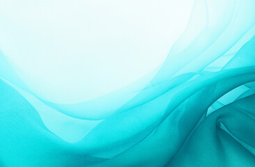 Abstract turquoise fabric texture with flowing waves and soft gradient, ideal for backgrounds or...