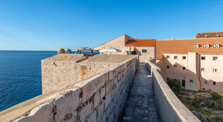 Obraz premium Picturesque view on old town Dubrovnik, Croatia, Adriatic Sea, Europe. Dalmatian coast. orange tile roofs.