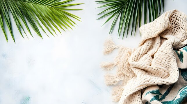 White Background With Green Palm Leaves And Beige Blanket