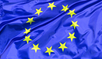 The flag of  the EU European Union flutters in the wind