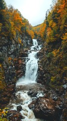 Waterfall Flowing Through Autumn Forest