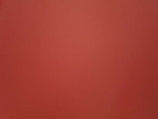 Simple warm colored background. Empty terracotta background. Space for text