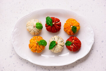 Pumpkin-Shaped Cheese Balls with Spices.selective focus