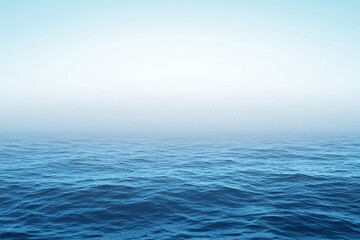 Blue Ocean Waves Under Foggy Sky