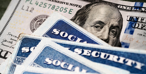 Social Security Cards with US One Hundred Dollar Bill $100
