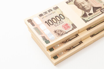 白背景に一万円の札束