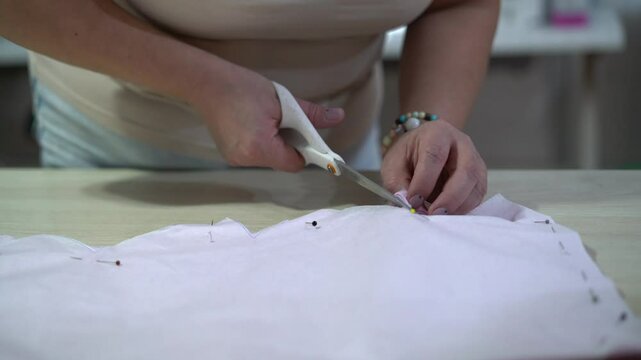 Sewing workshop for kids. Working in the sewing atelier. 