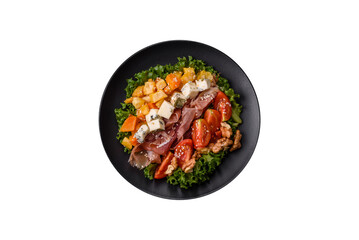 Appetizing salad with prosciutto, pumpkin, cheese and tomatoes