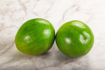 Two ripe green exotic avocado fruit