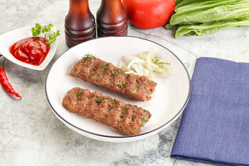 Kebab with beef served onion