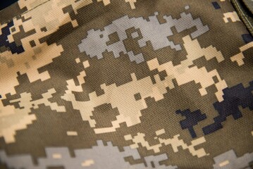 Camouflage uniform for a Ukrainian soldier. background
