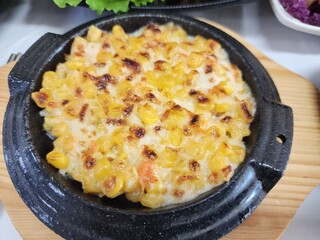Korean sashimi restaurant side dishes. sweet corn cheese
