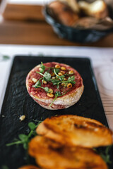 Bruschetta served as appetizer on a gathering in a restaurant. Food and drink concept.