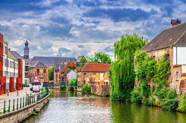 Ghent cityscape, embankment and old brick buildings on bank of Lieve water canal, Bridge Imperial...
