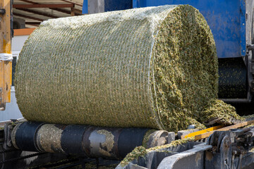 Industrial feed bale making machine
