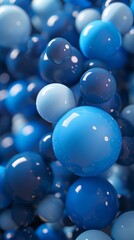 Blue spheres of various sizes with a glossy surface