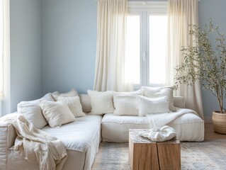 A minimalist winter living room with soft blue calm walls, white furnishings, and cozy textiles