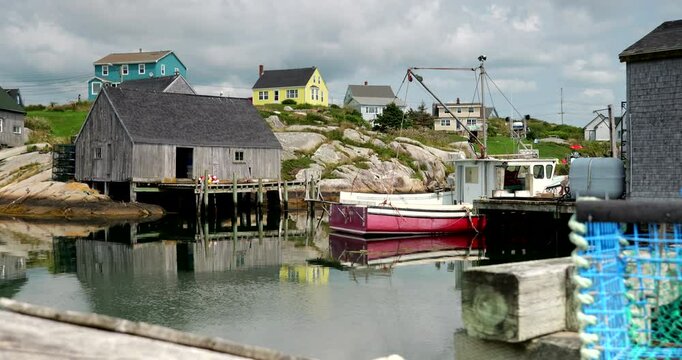 Peggy's Cove, Nova Scotia Canada - August 15, 2024:  Picturesque Peggy&rsquo;s Cove in Nova Scotia, a charming coastal village known for its iconic lighthouse, rugged rocks, and scenic ocean views.