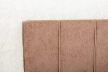 Brown soft headboard. Vandal-proof fabric