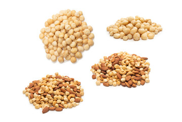 Macadamia nuts isolated on white background.