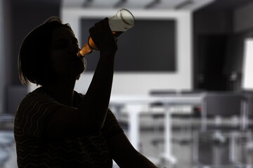 Concept of alcoholism drunk, young man hold bottle