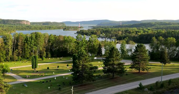 The pristine Nipigon River winds through the rugged wilderness of Northern Ontario, surrounded by dense forests and untouched natural beauty
