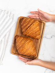 freshly baked golden french croissants