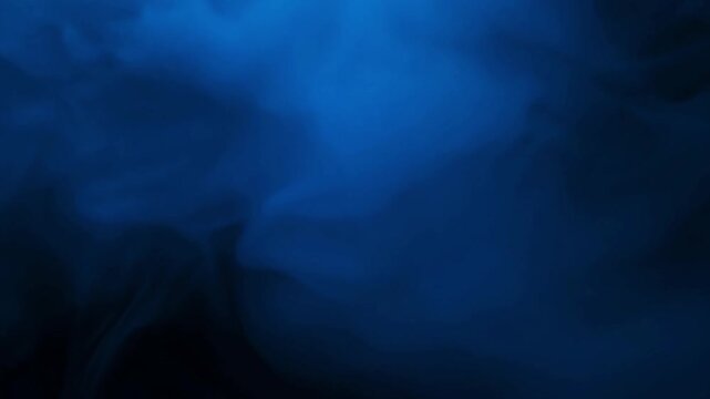 Blue smoke is on a black background