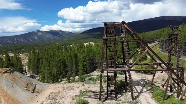 Abandoned mine ruins near Leadville, Colorado. Shot is a flyby shot of a well preserved head frame.