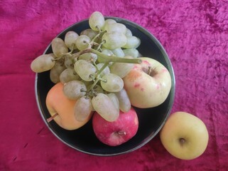 fresh fruits on a plate