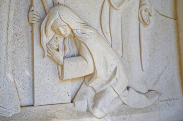 Mary Magdalene at the foot of the cross. Jesus dies on the cross – Station XII of the Way of the...