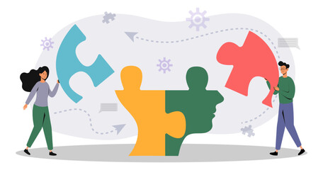 People working together to connect colorful puzzle pieces in a collaborative effort
