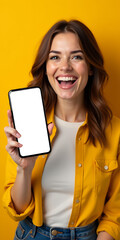 Woman with Smartphone Mockup: Excited Female Presenting Blank Mobile Screen on Vibrant Yellow Background for App or Product Showcase