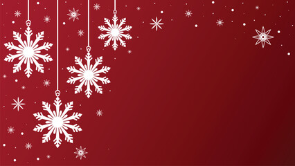 A festive red background with white snowflakes of various sizes. Minimalist design of snowflake hanging from strings, for Christmas, and the holiday season.