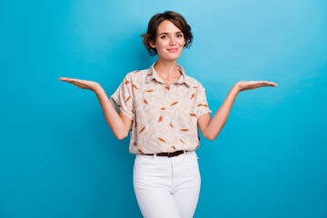 Photo of pretty person arms palms hold demonstrate empty space vs scales isolated on blue color...