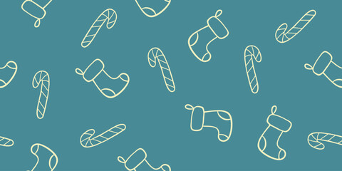 Seamless pattern with Christmas stockings and candy canes outlines on blue, doodle style vector