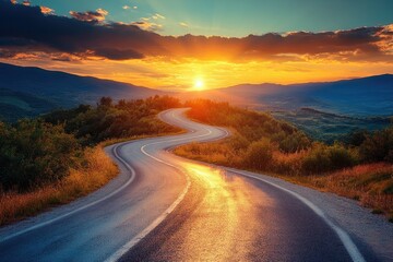 Fototapeta premium A winding road leads to a sunset. Perfect for travel, journey, or adventure themes.
