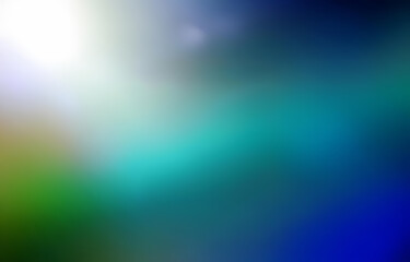 Obraz premium A blurred gradient background in shades of green, blue, and white.