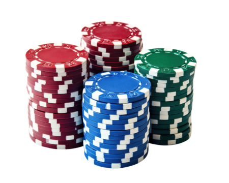 Colorful casino poker chips stacked, isolated on white background.