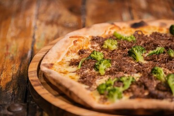 pizza with meat and vegeteables