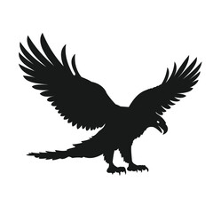 silhouette of eagle flapping wings