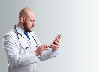 Portrait of happy doctor wearing med uniform at hospital